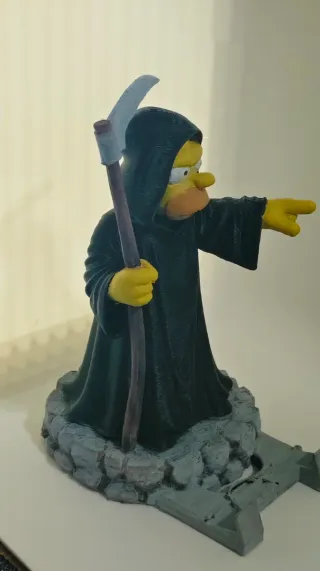 Soporte móvil Homer Simpson Parca