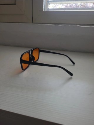 Occhiali da sole unisex neri lenti arancioni