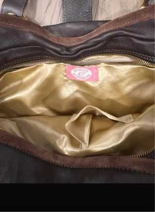 Borsa in pelle marrone con borchie