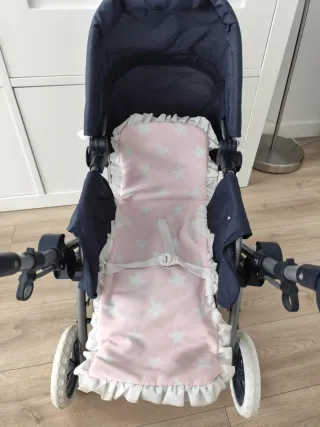 Carrito de muñecas azul y rosa LA NINA