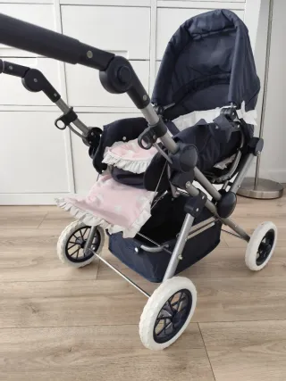 Carrito de muñecas azul y rosa LA NINA