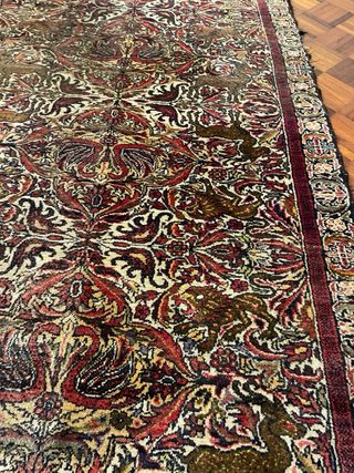 Antico tappeto annodato a mano in lana