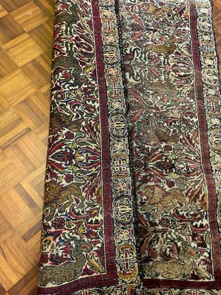 Antico tappeto annodato a mano in lana