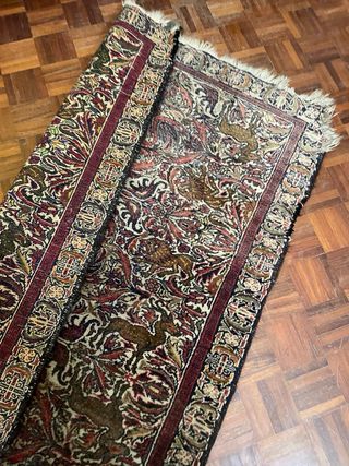 Antico tappeto annodato a mano in lana