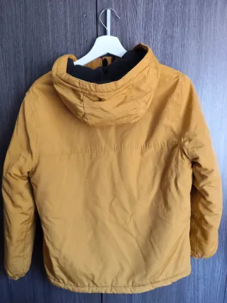 Cazadora Carhartt tipo canguro amarilla