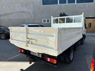 Camión Nissan NT400 Volquete y Basculante