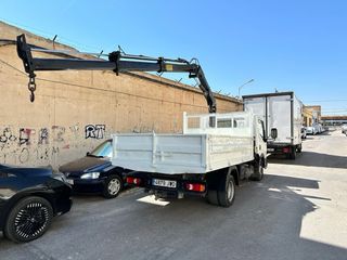 Camión Nissan NT400 Volquete y Basculante