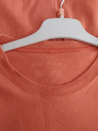 Camiseta manga corta color naranja con bolsillo