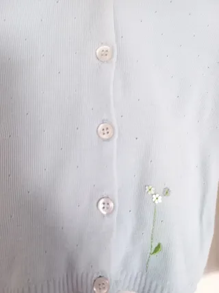 Casaco de criança azul com capuz