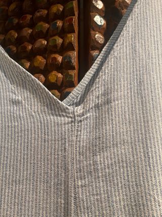 Peto de rayas azul y blanco