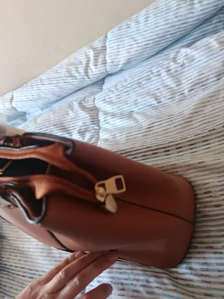Bolso marrón anaranjado. Nuevo sin estrenar