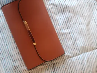 Bolso marrón anaranjado. Nuevo sin estrenar