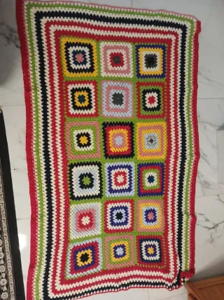 Manta tejida a mano multicolor
