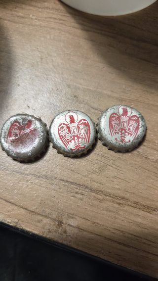 Chapas antiguas de coleccionismo con águila