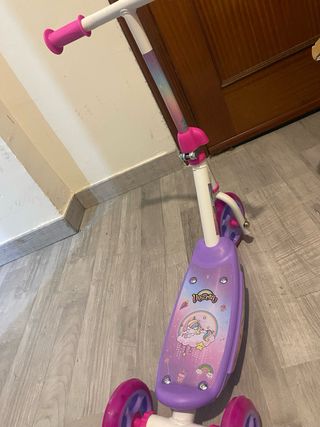 Patinete  rosa de unicornio practicamente nuevo