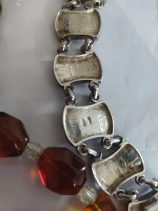 Reloj Cartier y collares