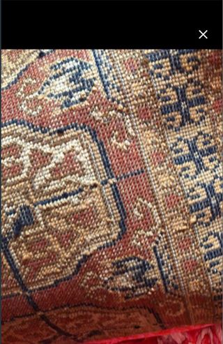 Alfombra de lana marrón y roja
