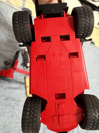 Carretilla elevadora Bruder + set logistica