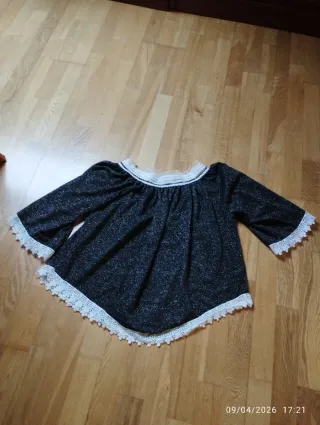 Blusón brillante con encaje