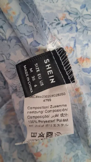 Vestito donna allacciato al collo floreale
