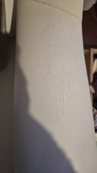 Mecedora blanca de piel / lactancia