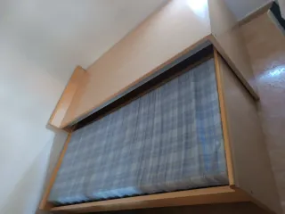 Cama nido con cajones madera y tela