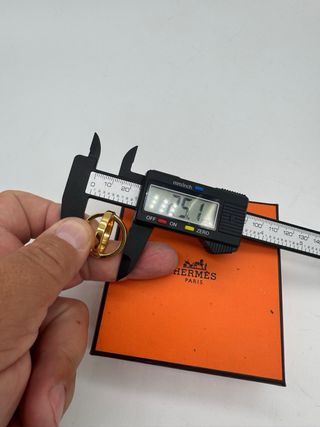Anillo Hermes Dorado .