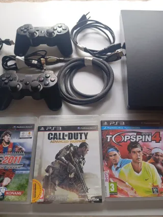 Consola PS3 Negra + 4 Juegos + Accesorios