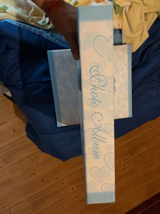 Álbum de fotos con diseño de corazones