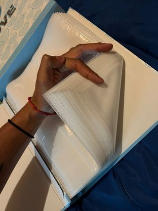 Álbum de fotos con diseño de corazones