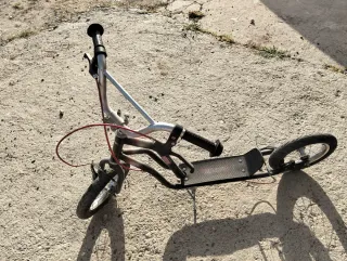 Bicicleta BMX Naranja Y patinete de rueeas de bici