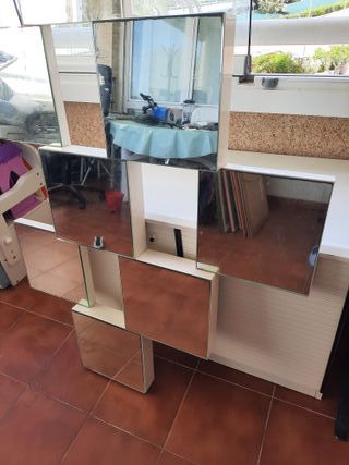 Espejo en panel cuadrículas irregulares