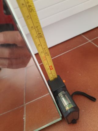 Espejo en panel cuadrículas irregulares