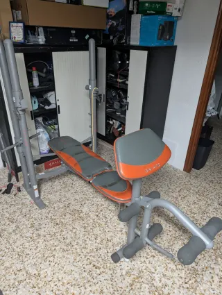 Banco de pesas con polea alta