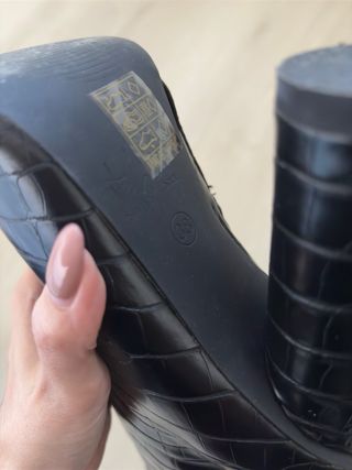 Botas pretas salto alto