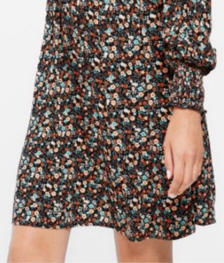 Vestido Springfield floral manga larga