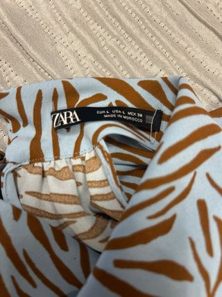Top Zara estampado cebra azul y marrón