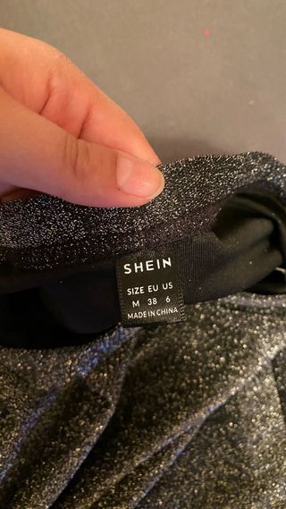 Falda brillante plateada y negra