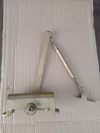 Muelle o Freno de Puerta