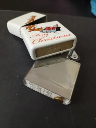 Zippo Natalino Papai Noel e Rena