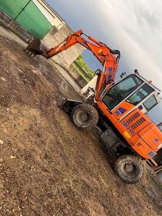 Retro excavadora Hitachi 120 W