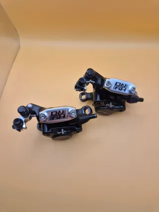 Coppia pinze freni ibridi TRP HY/RD