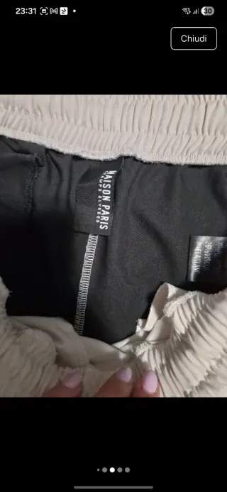 Pantaloni beige e marroni