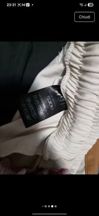 Pantaloni beige e marroni