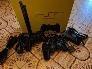 PlayStation 2 + Giochi e Accessori