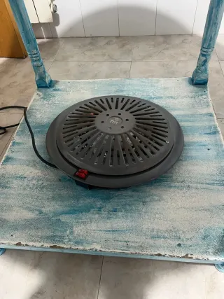 Mesa camilla redonda con brasero
