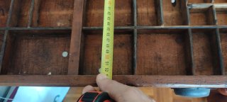 Cajonera de madera de antigua mercería