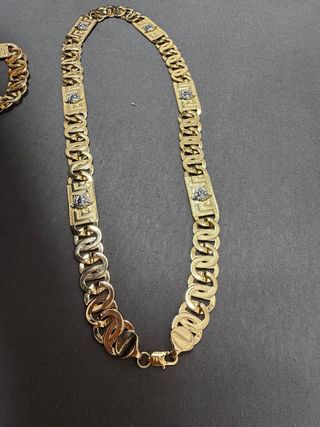 Cadena y pulsera bañadas en oro