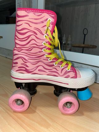 Patines de niña rosas con cordones amarillos