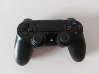 PS4 500GB + Caja + Mando + 4 Juegos